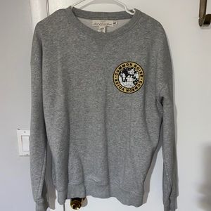 Grey H&M sweatshirt with graphic design